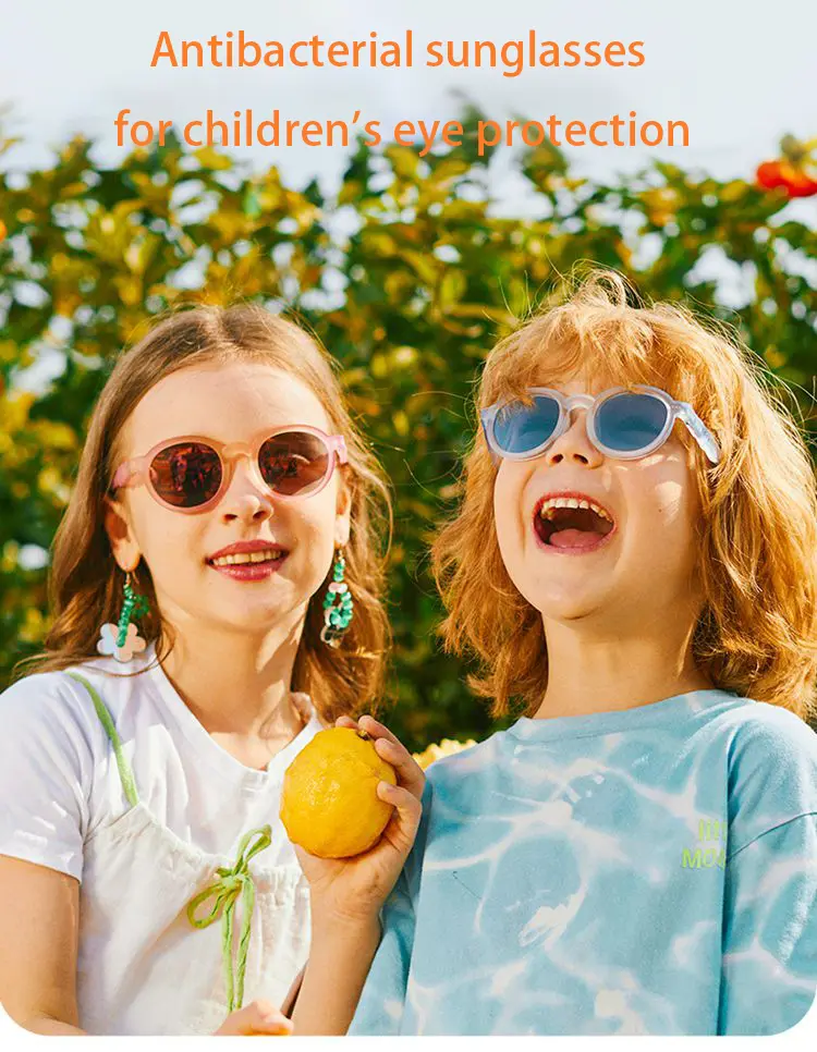 Two girls wearing KiGO California kids designer sunglasses​ laughing in the sun, antibacterial sunglasses for children's eye protection