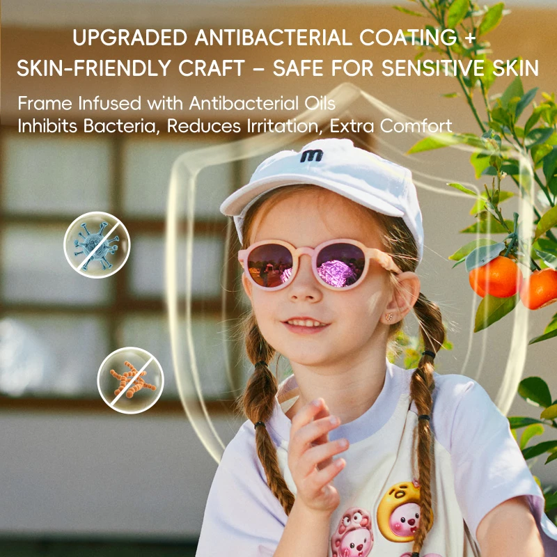 A girl wearing KIGO California sunglasses for kids party and a white cap. Text describes "UPGRADED ANTIBACTERIAL COATING + SKIN-FRIENDLY CRAFT – SAFE FOR SENSITIVE SKIN", noting the frame is infused with antibacterial oils to inhibit bacteria and reduce irritation.