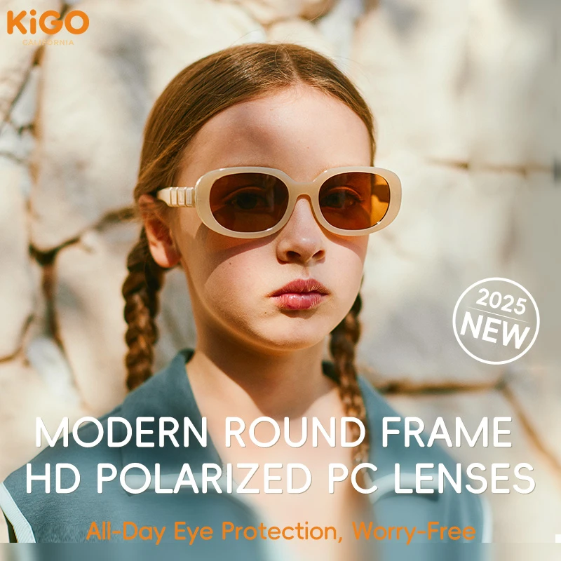 A girl wearing KIGO California's 2025 new sunglasses with a modern round frame and HD polarized PC lenses, set against a stone wall. Text highlights "MODERN ROUND FRAME HD POLARIZED PC LENSES" and "All-Day Eye Protection, Worry-Free".