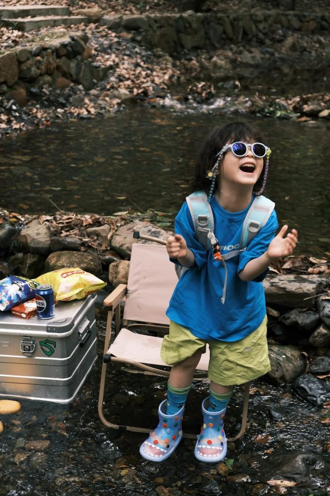 toddler wearing UV400 sunglasses in summer